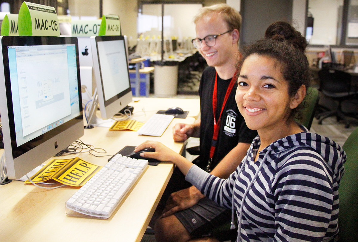 two students in computer lab